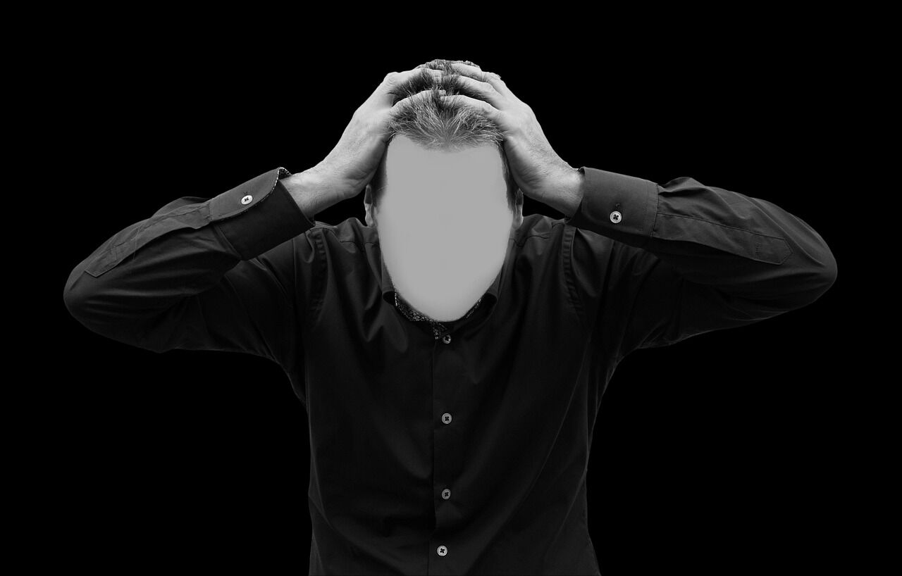 A person looking distressed, reflecting the emotional impact of depression