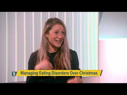 A person speaking, representing mental health discussion and support.